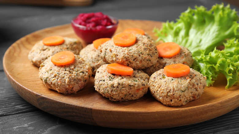 plate of gefilte fish with carrot 