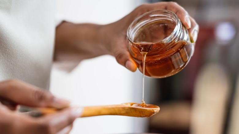 pouring golden syrup onto spoon