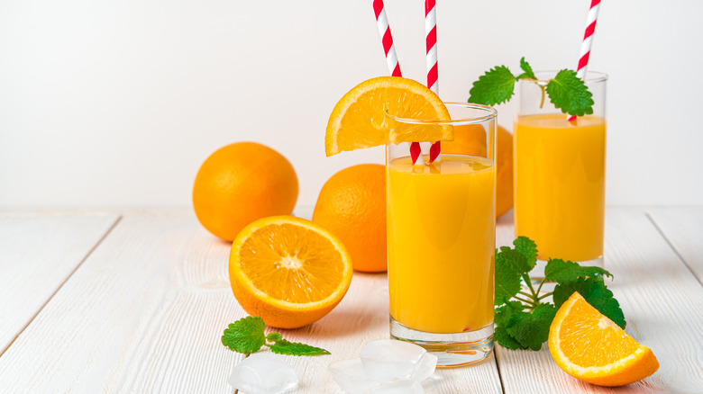 Orange juice, halves, and slices