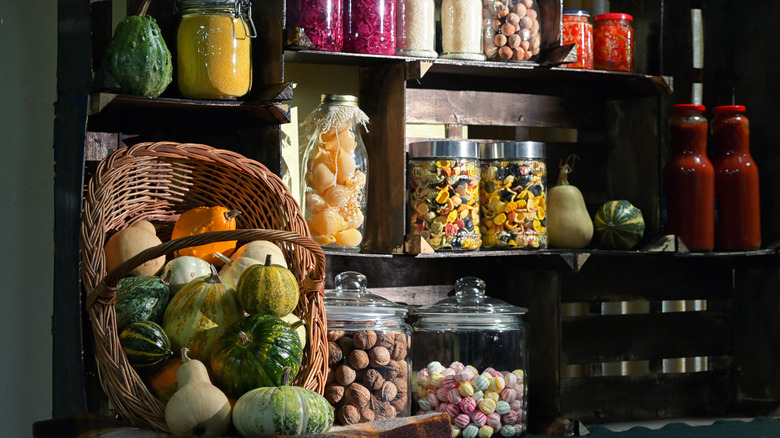 Pantry with vegetables, sauces, and pickles