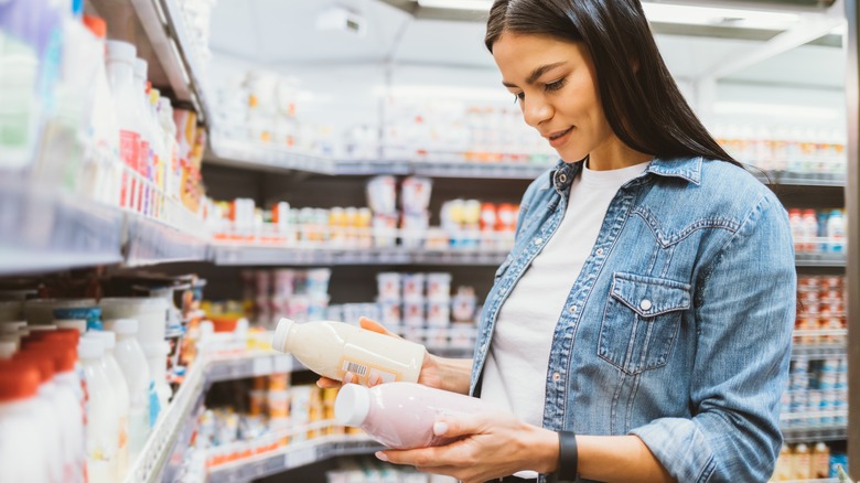 Woman reading a food label