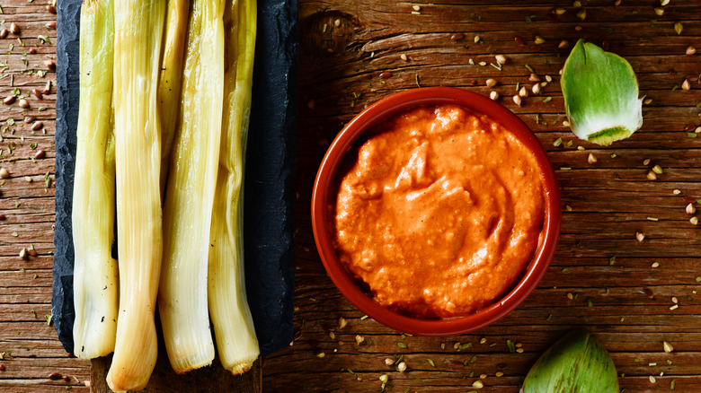 Fresh romesco and spring onions
