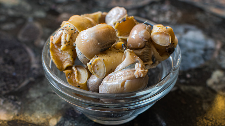 shelled whelks in glass bowl