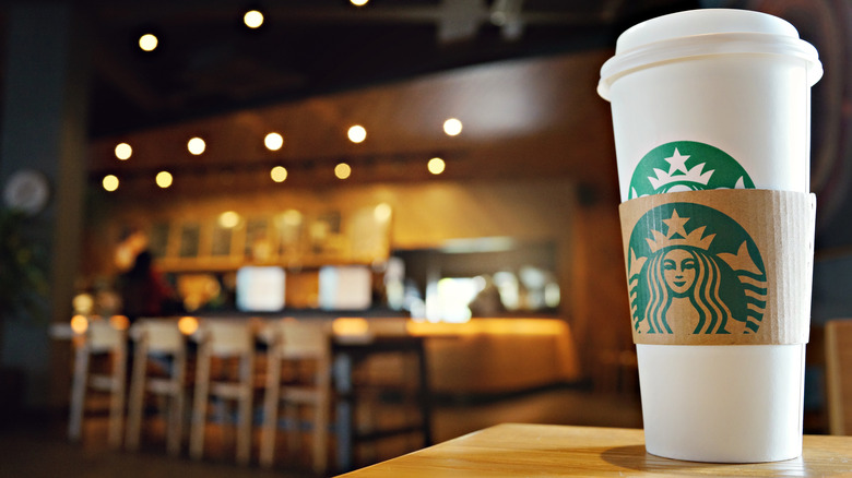 Starbucks cup, blurred background