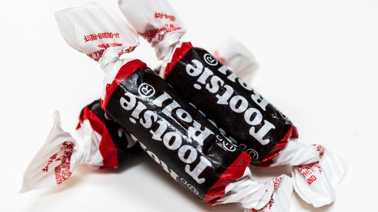 Three Tootsie Rollls close up