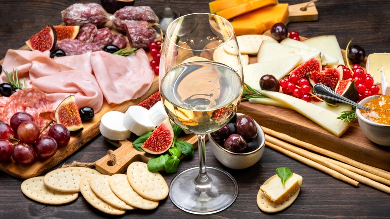 charcuterie board with wine