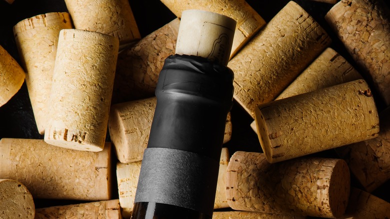 Wine bottle laying in corks