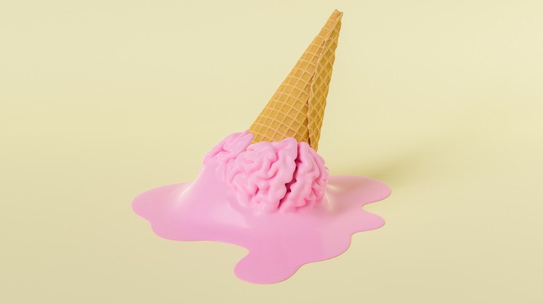 Upside down brain-shaped ice cream cone melting