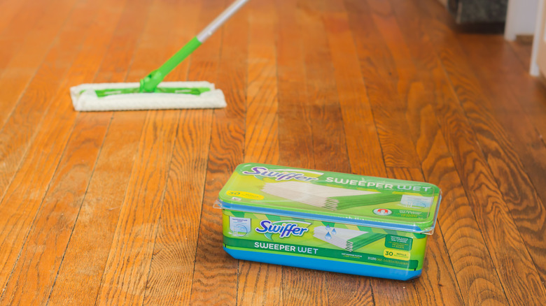 Swiffer Sweeper on wooden floor.