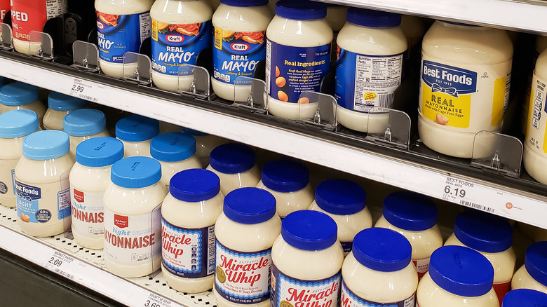 Shelf of different mayonnaise brands
