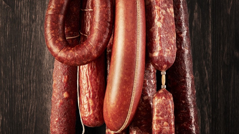 Various types of dried salami and pepperoni