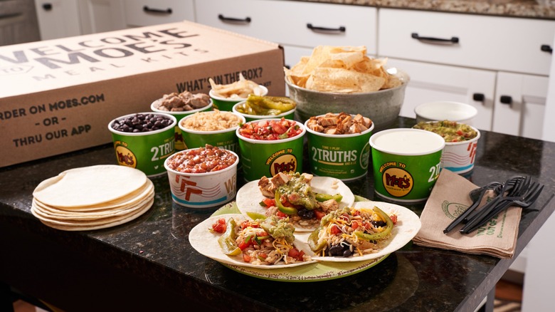 Moe's catering spread across table