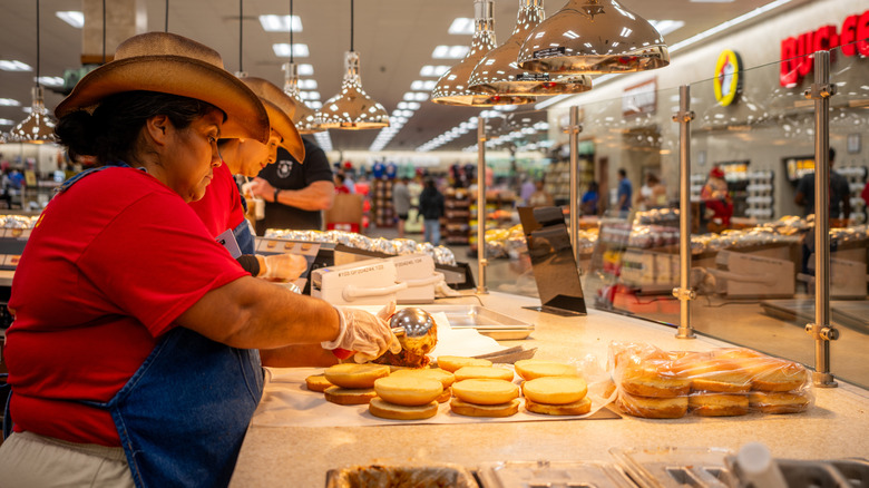 Food server prepping sandwiches at Buc-ee's
