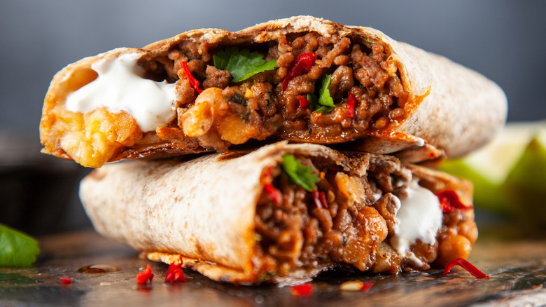 Chili cheese burritos stacked