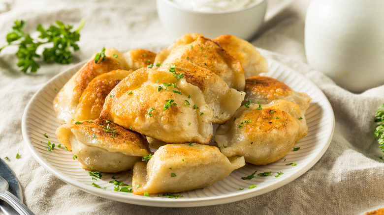 Plate of fresh cooked pierogi.