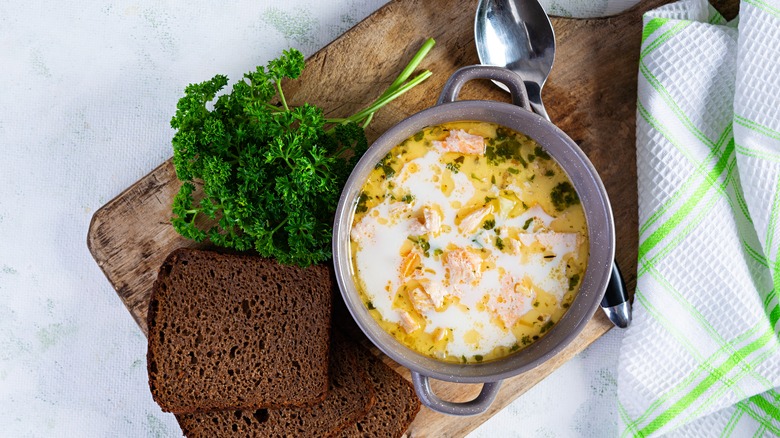 Bowl of soup with rye bread
