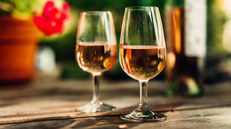 Two glasses of rosé on outdoor table