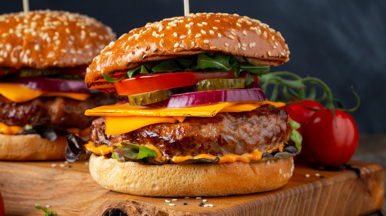 Hamburger on a sesame bun with condiments
