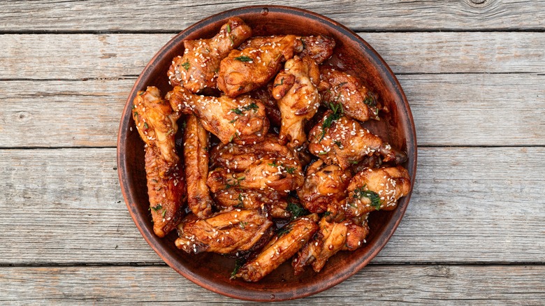 a full bowl of chicken wings waiting to be dug into