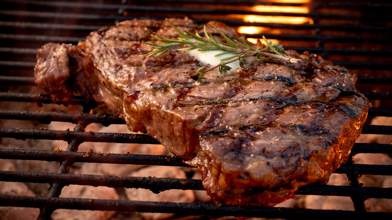 Ribeye steak on grill