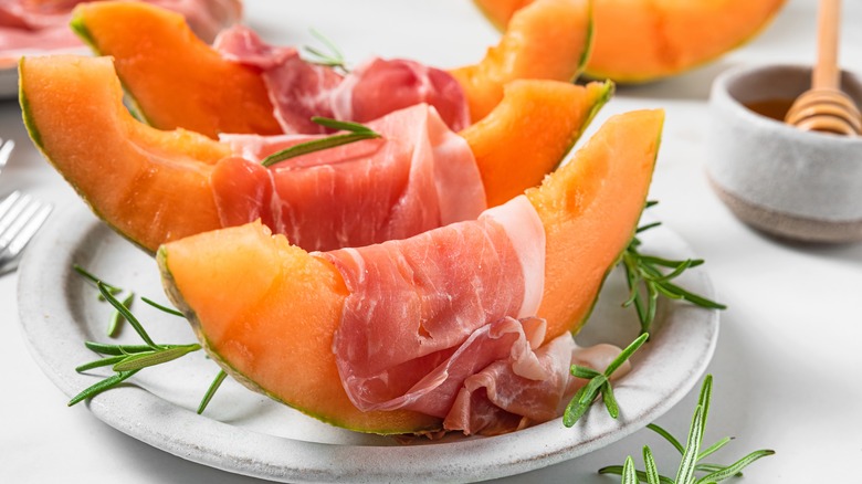 prosciutto and melon on a plate 