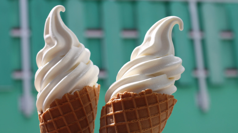 pair of vanilla soft serve cones