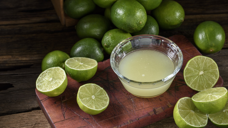 limes and lime juice in bowl