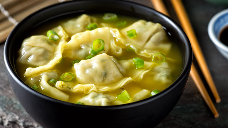Wonton soup with green onions