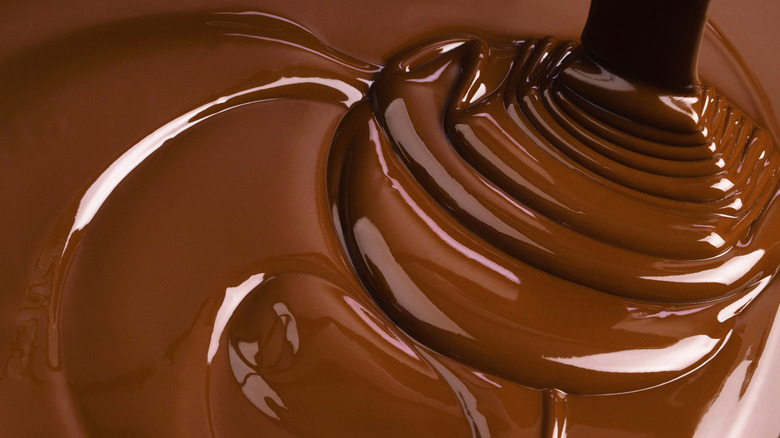 Close up of rippling chocolate syrup