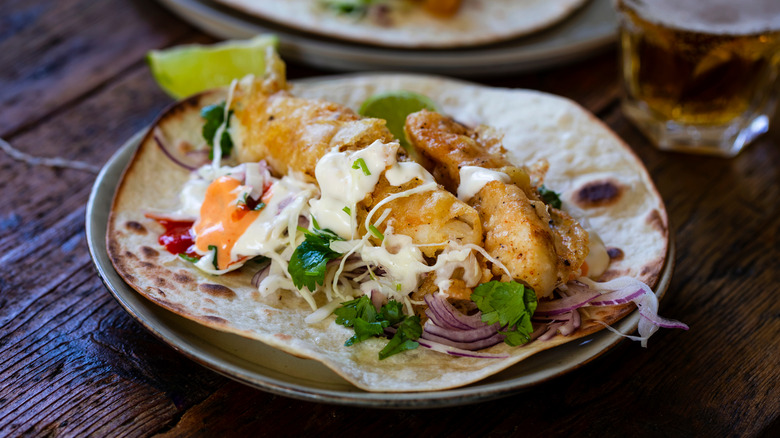 fish taco with white sauce