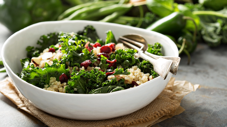 Healthy salad with kale, beans, and grains 