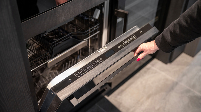 Opening an empty dishwasher