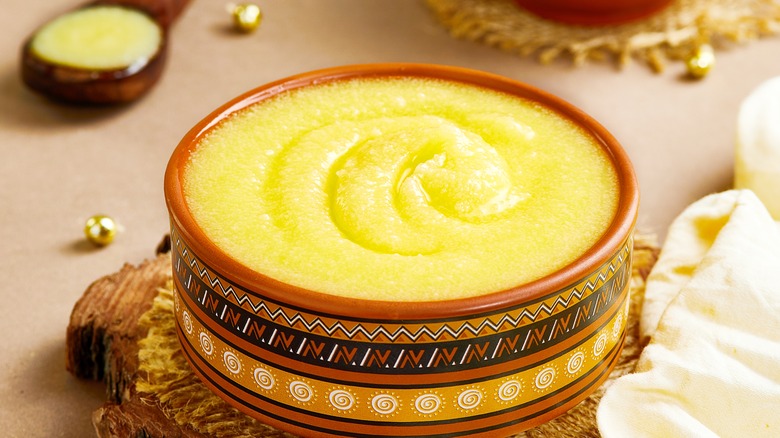 Ghee in wooden bowl