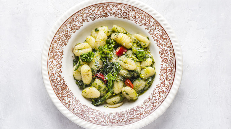 Overhead view of cooked gnocchi in a bowl