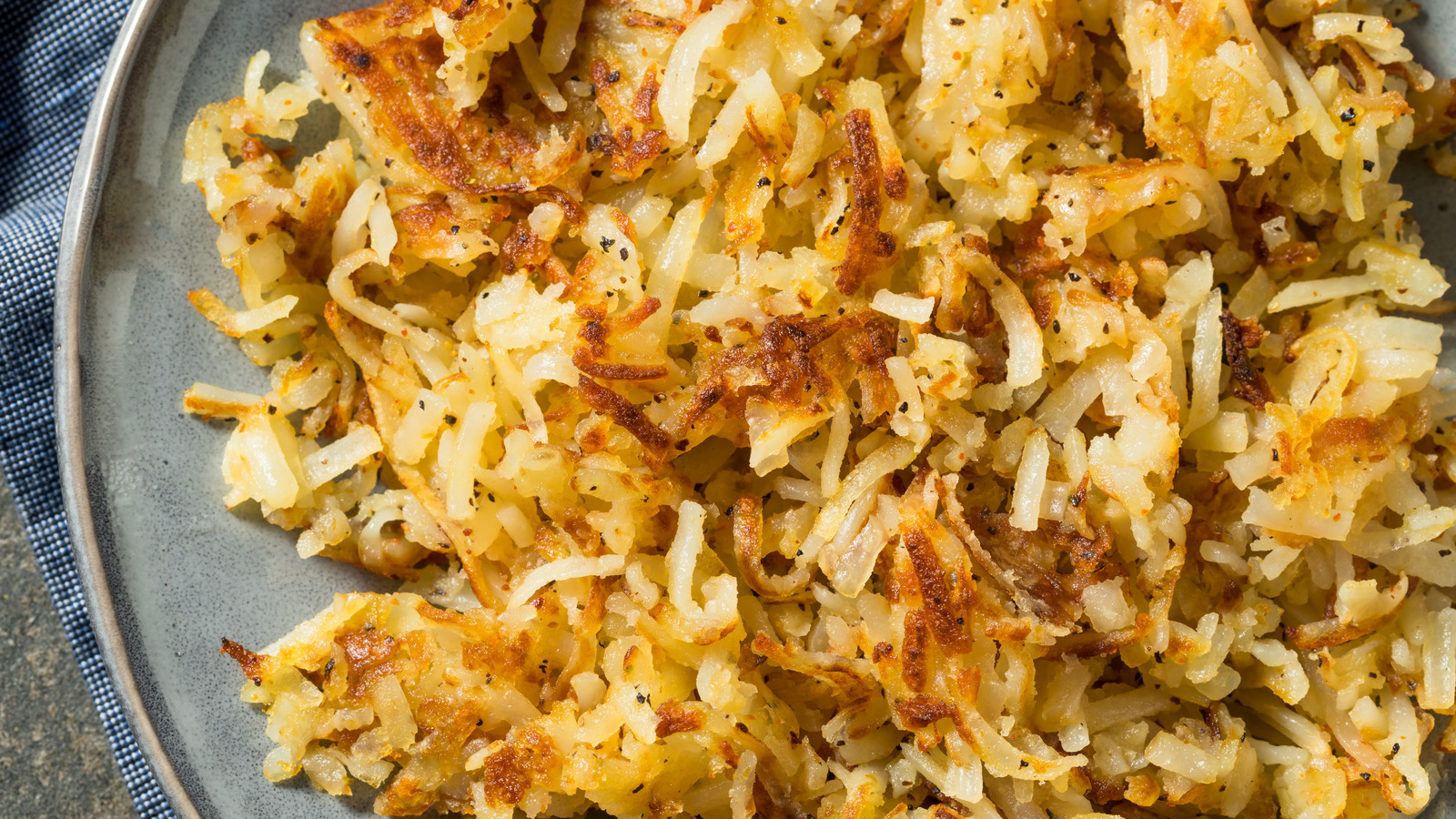What's The Best Way To Grate Potatoes For Crispy Hash Browns?