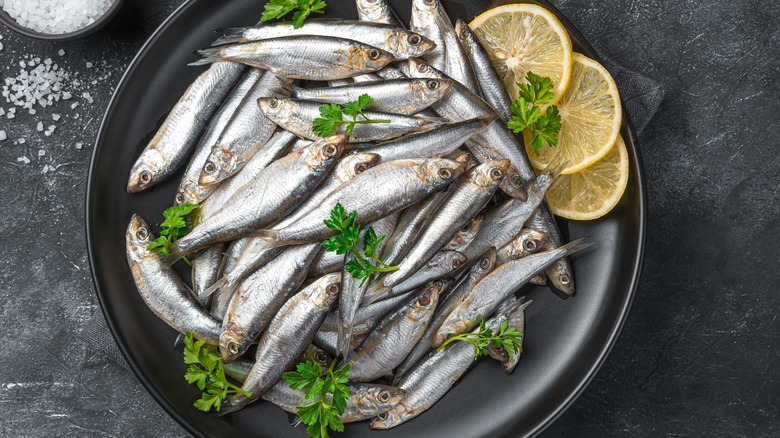 Plate of anchovies with lemon