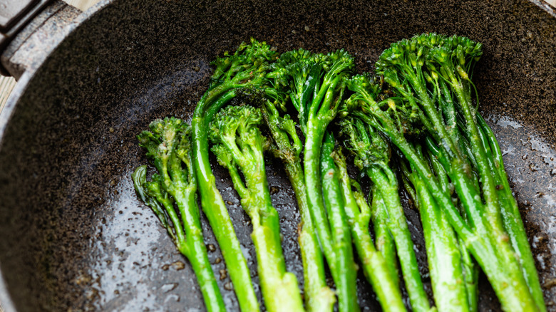 Sautéed broccolini in a pan
