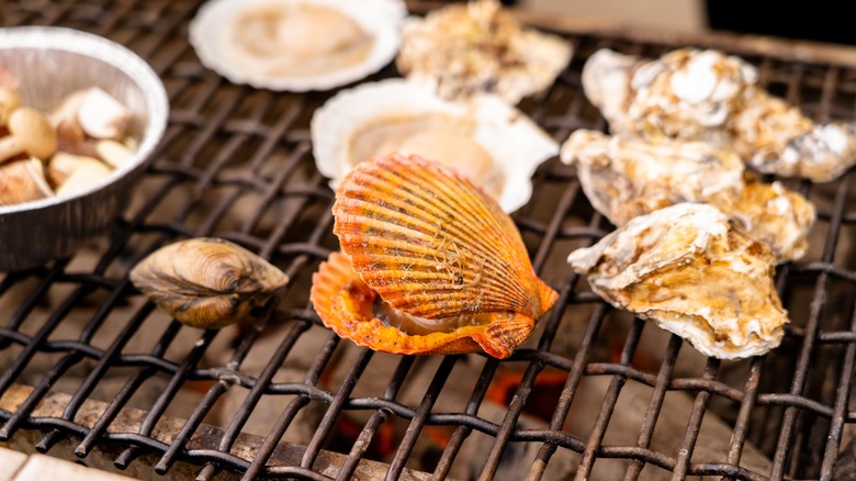 Oysters and clams on a grill