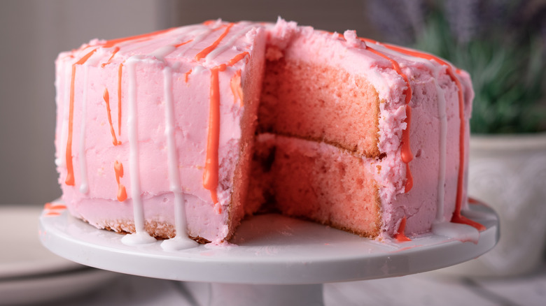 pink cake on cake stand