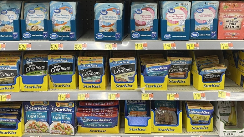 Store aisle of pouch tuna products