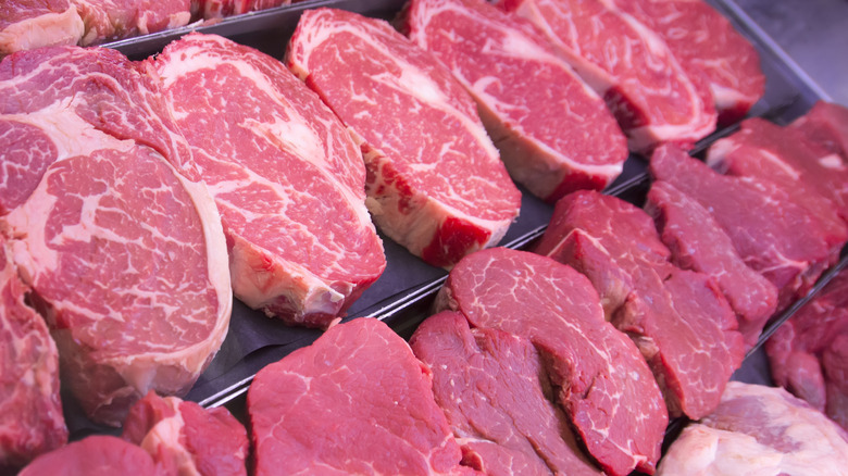 Raw thick-cut steaks