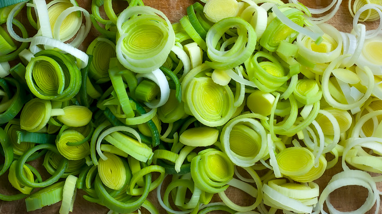 Chopped leeks on cutting board 