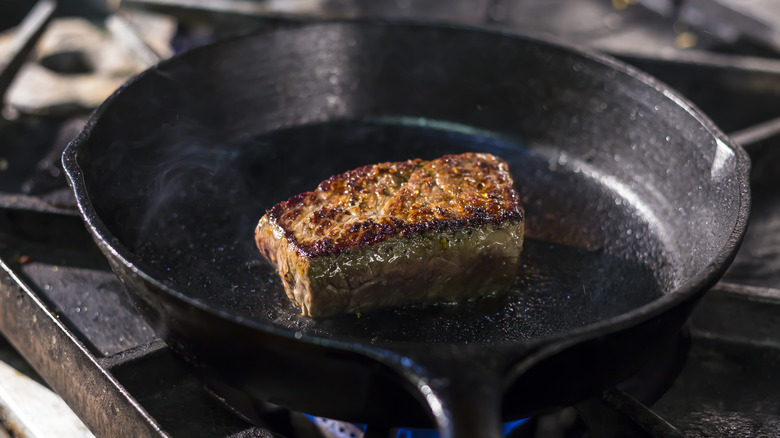 Steak searing in cast iron pan