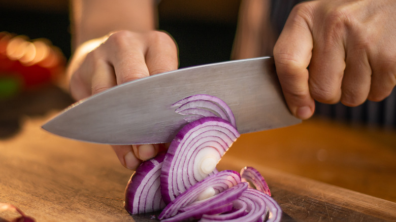 sharp knife chopping onions