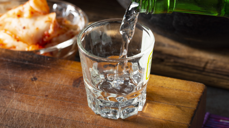 soju poured into glass