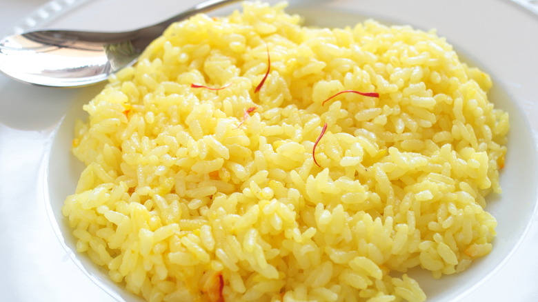bowl of yellow rice, perhaps Spanish rice