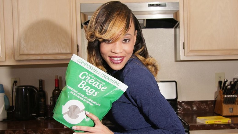 LaTangela Newsome holding Grease Bag