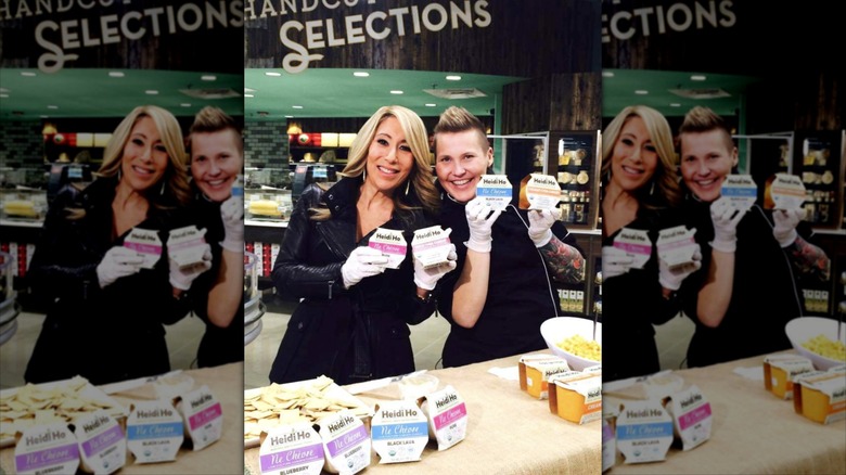 Heidi Lovig with Lori Greiner holding Heidi Ho cheese