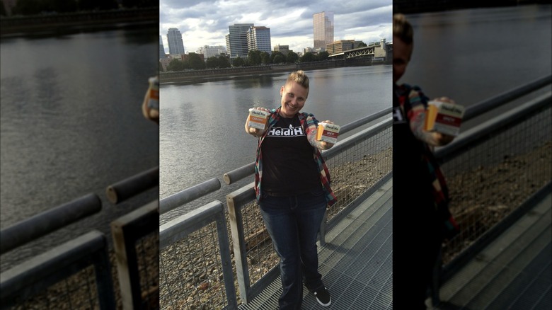 Heidi Lovig holding Heidi Ho cheeses