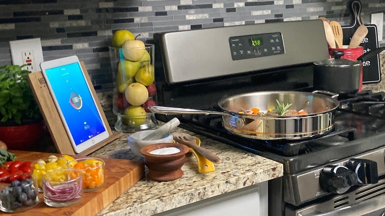 Ome app next to stovetop